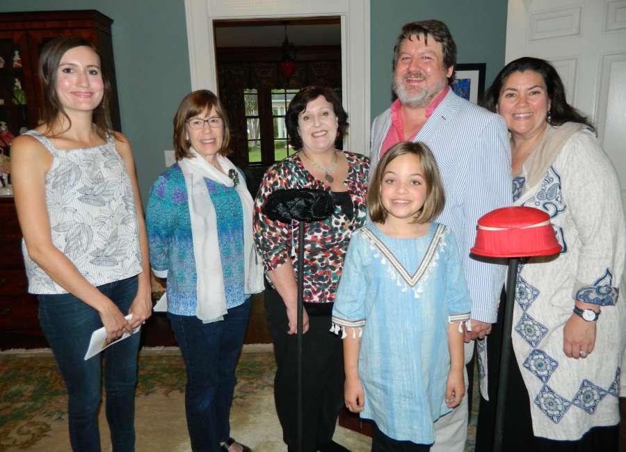 All of the poems are about hats: Historical Society reads poetry, checks out hat collection
