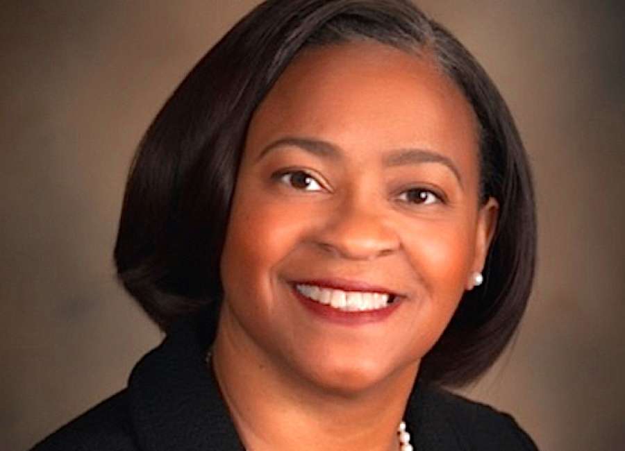 Alumna trades in lab coat for leadership role in UMC