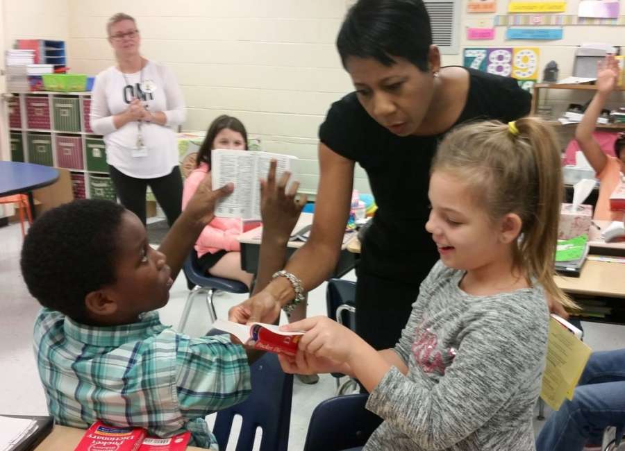 Bonnell Aluminum donates 1,600 dictionaries to Coweta third-graders