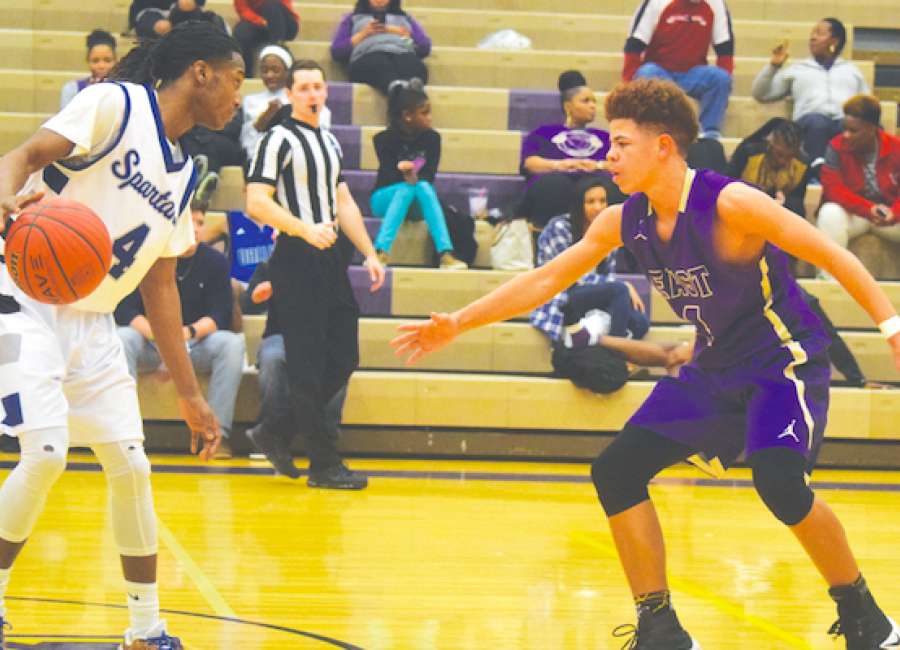 EC boys win in OT, girls fall at home