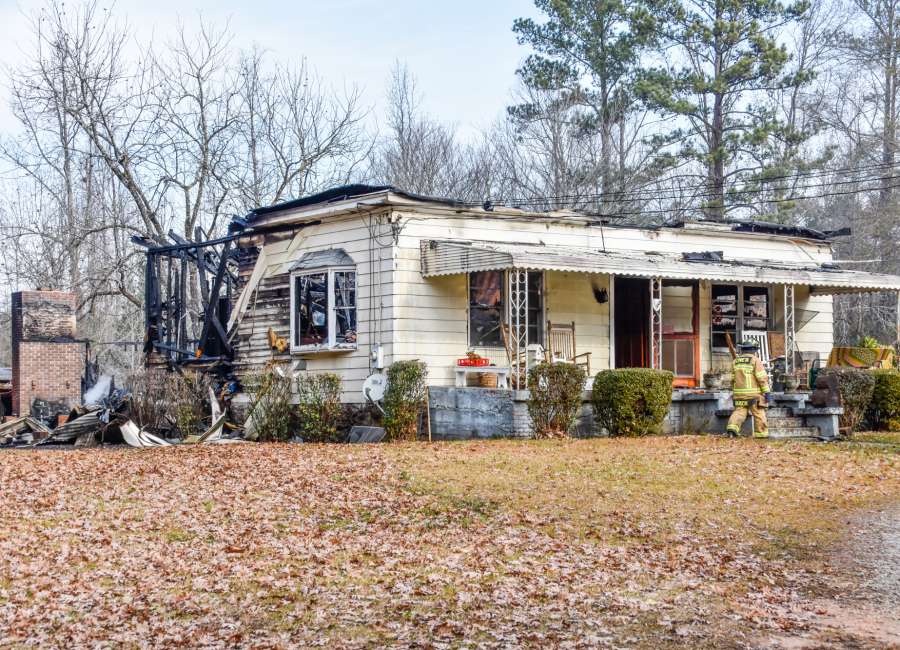 Elderly woman dies in house fire