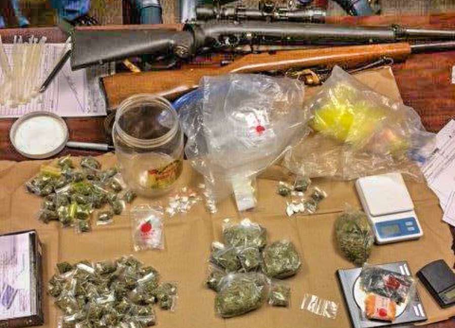 Probation-compliance check leads to seizure of narcotics, weapons