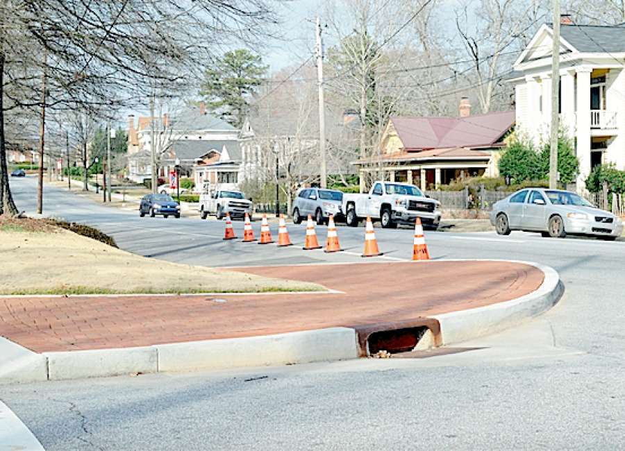 Traffic cones temporary fix to bump-out woes