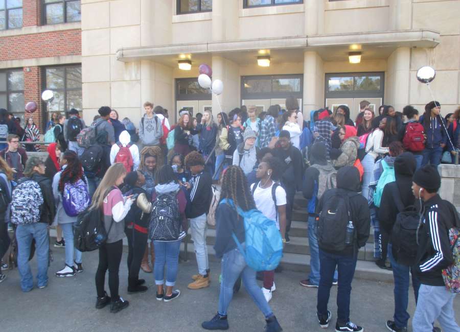 About 200 students walk out for protest at NHS