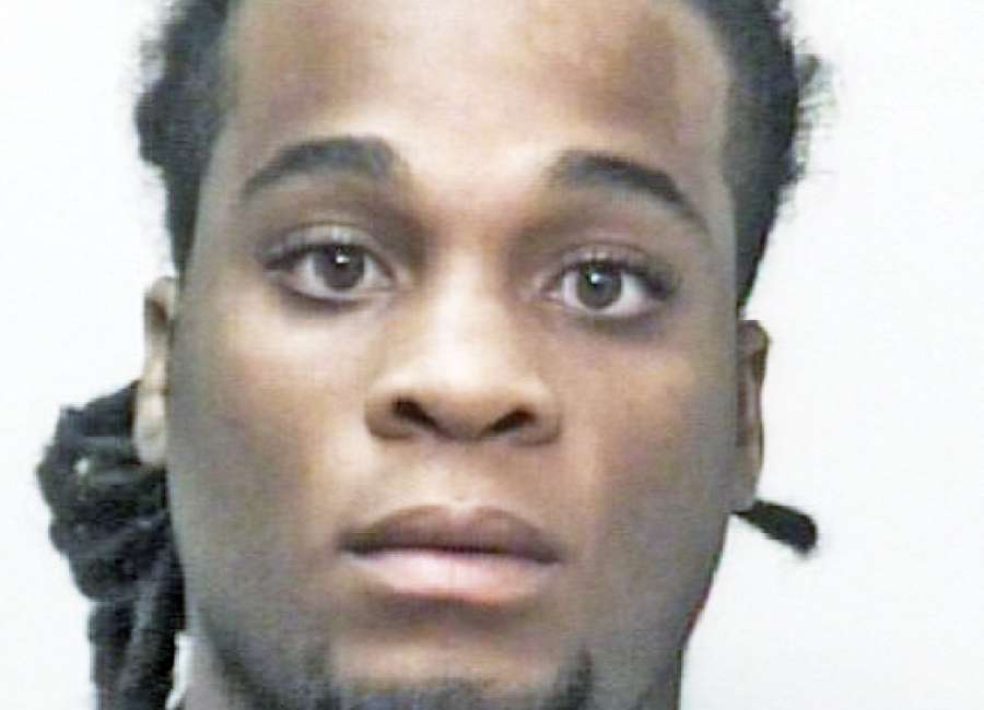 Armed robbery suspect held without bond
