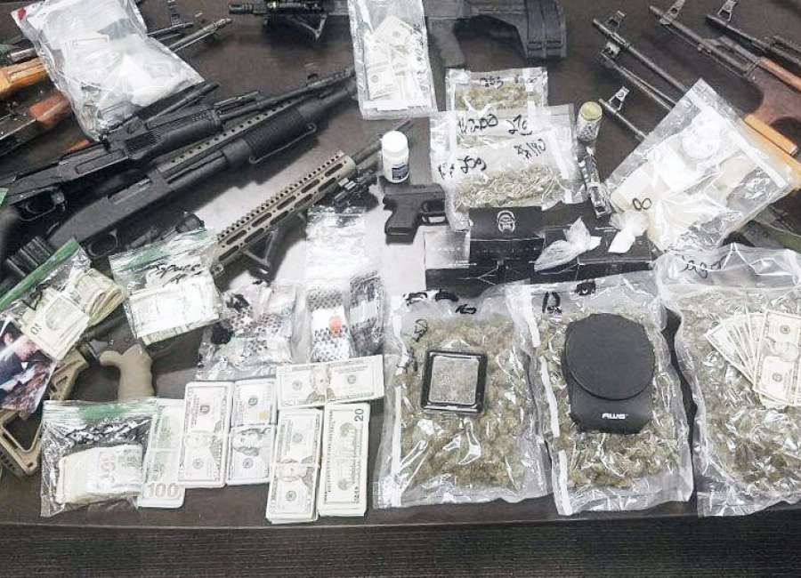 Drugs, guns and $55,000 seized from Senoia home