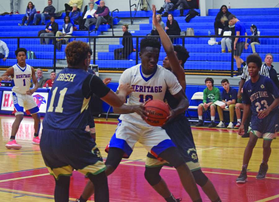 Heritage boys roll past Notre Dame