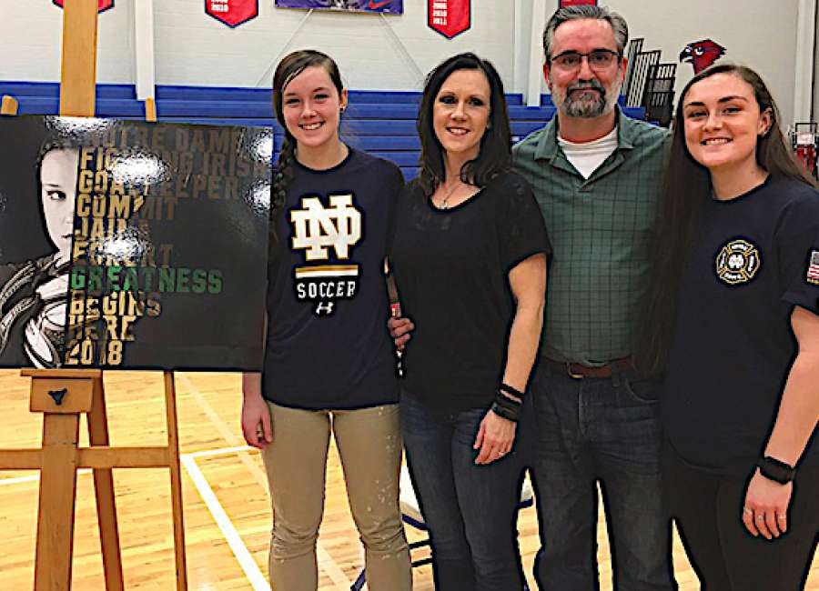 Heritage School senior signs with Irish