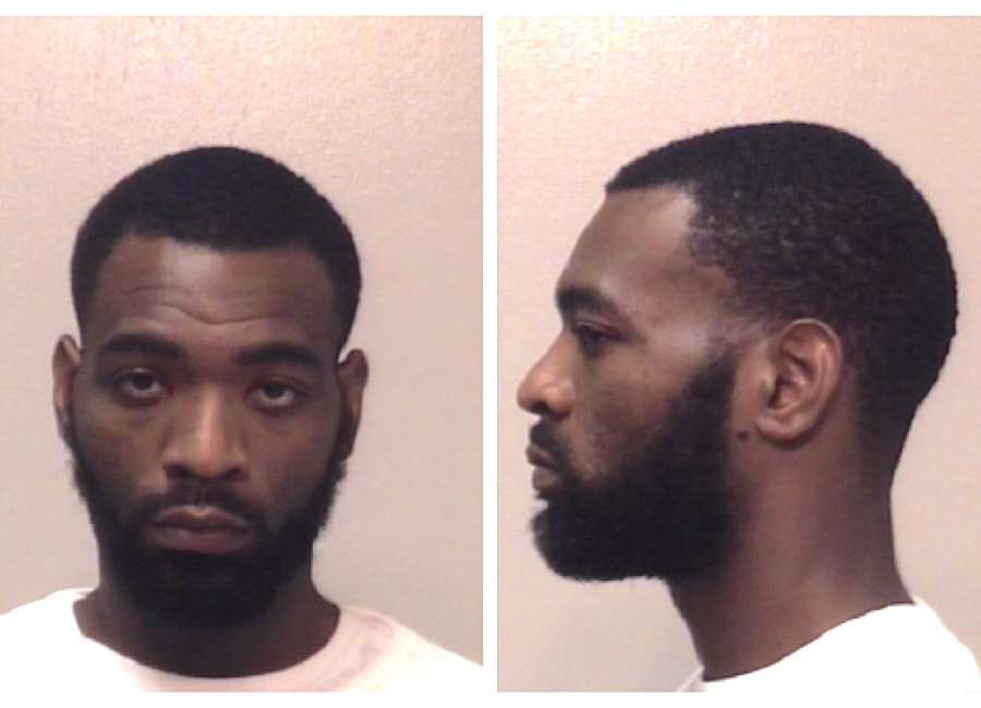 Home invasion suspect behind bars