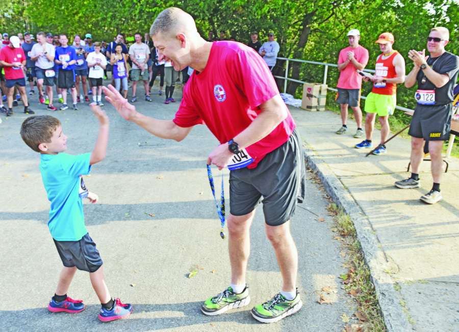 Jarrard offers congrats at Assault on Kennesaw