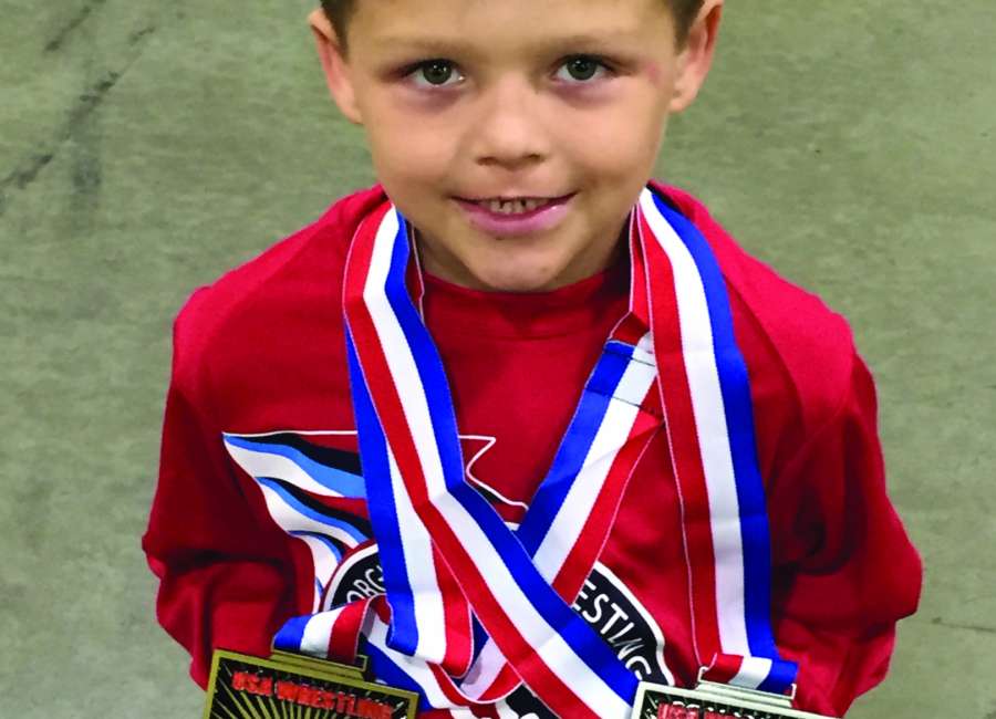 Javen Russo earning high marks in wrestling