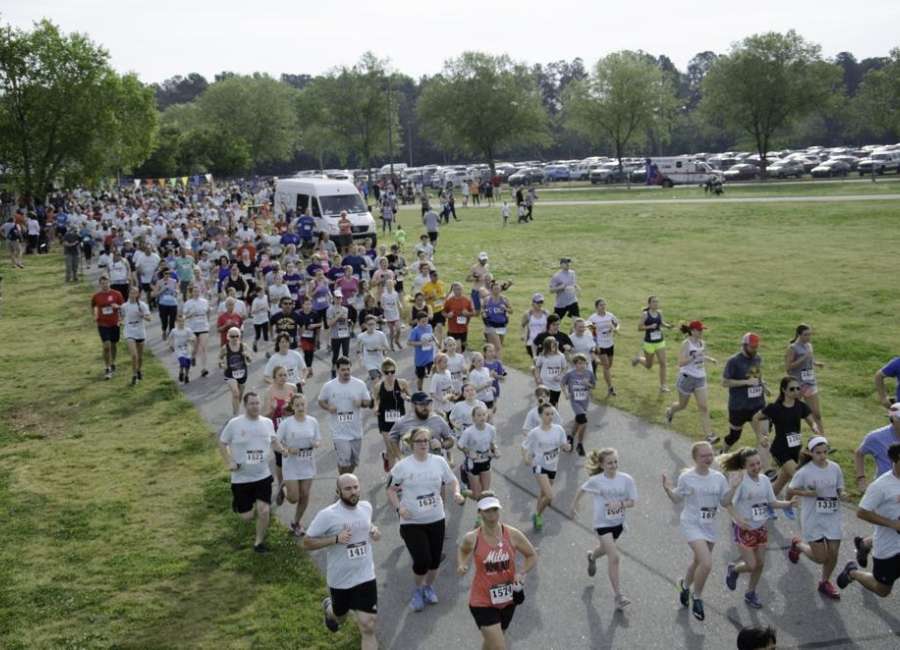 Local race raises record amount for adoptions