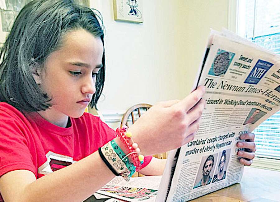 Nine-year-old Macie Crittenden has a nose for news