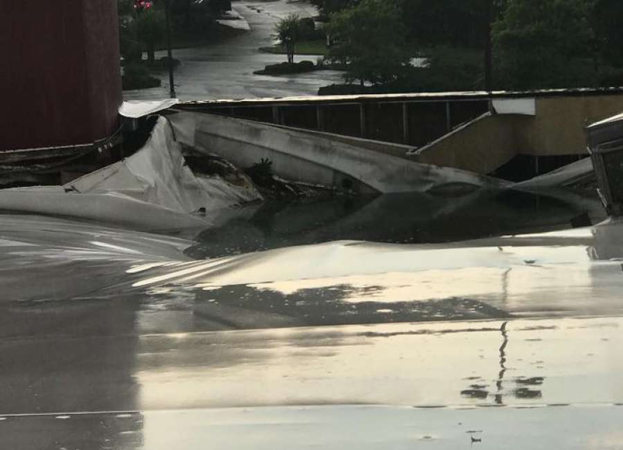 Storm damages roof of local bowling alley