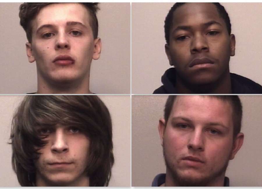 Four suspects in custody following armed home invasion