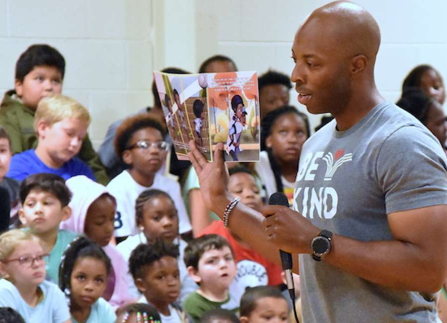 Tucker debuts book, encourages students to become authors